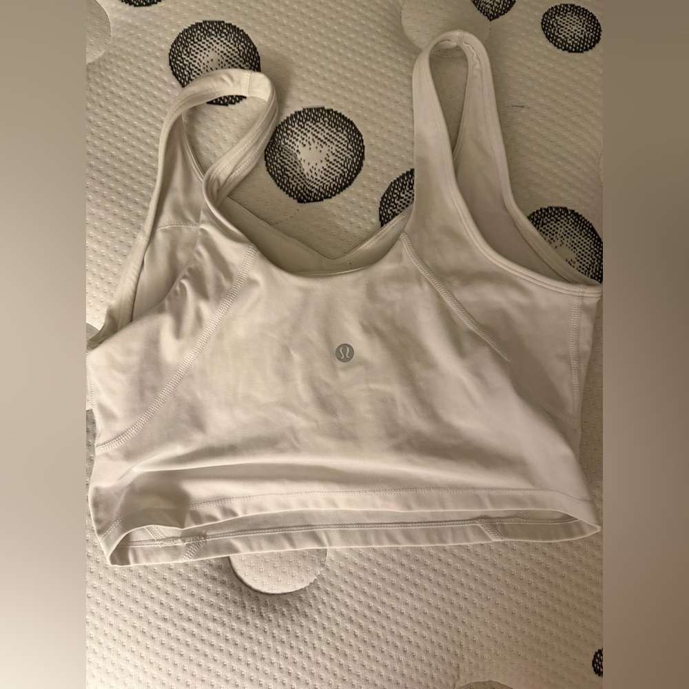 women 6 items 
5 sweaters and one tank